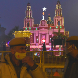 Delhi police standing outside the barricade of the Sacred Heart Cathedral