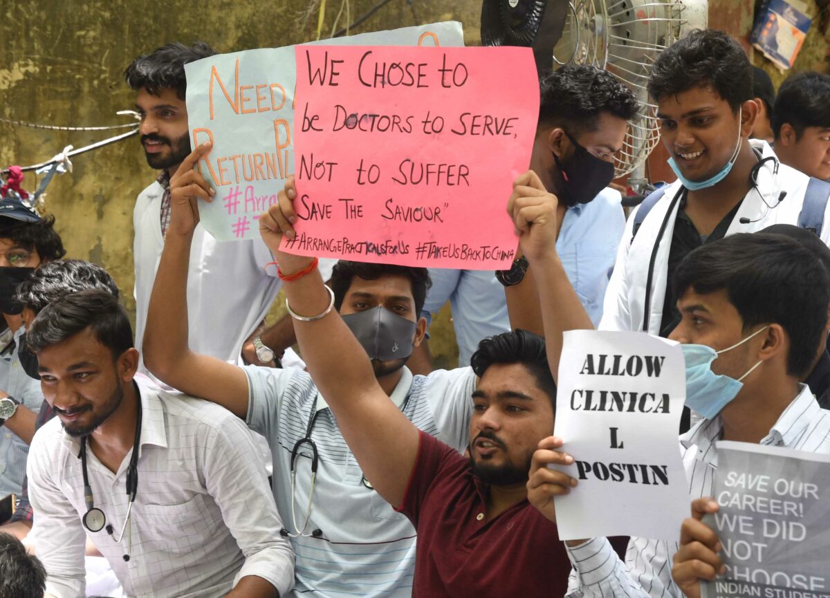 Indian Students of Chinese medical colleges stage a protest at Jantar Mantar, demanding return to China-based universities, in New Delhi on Sunday. They also demands  the NMC to accommodate students for clinical practice alone in India till the time they are allowed to go back to China.