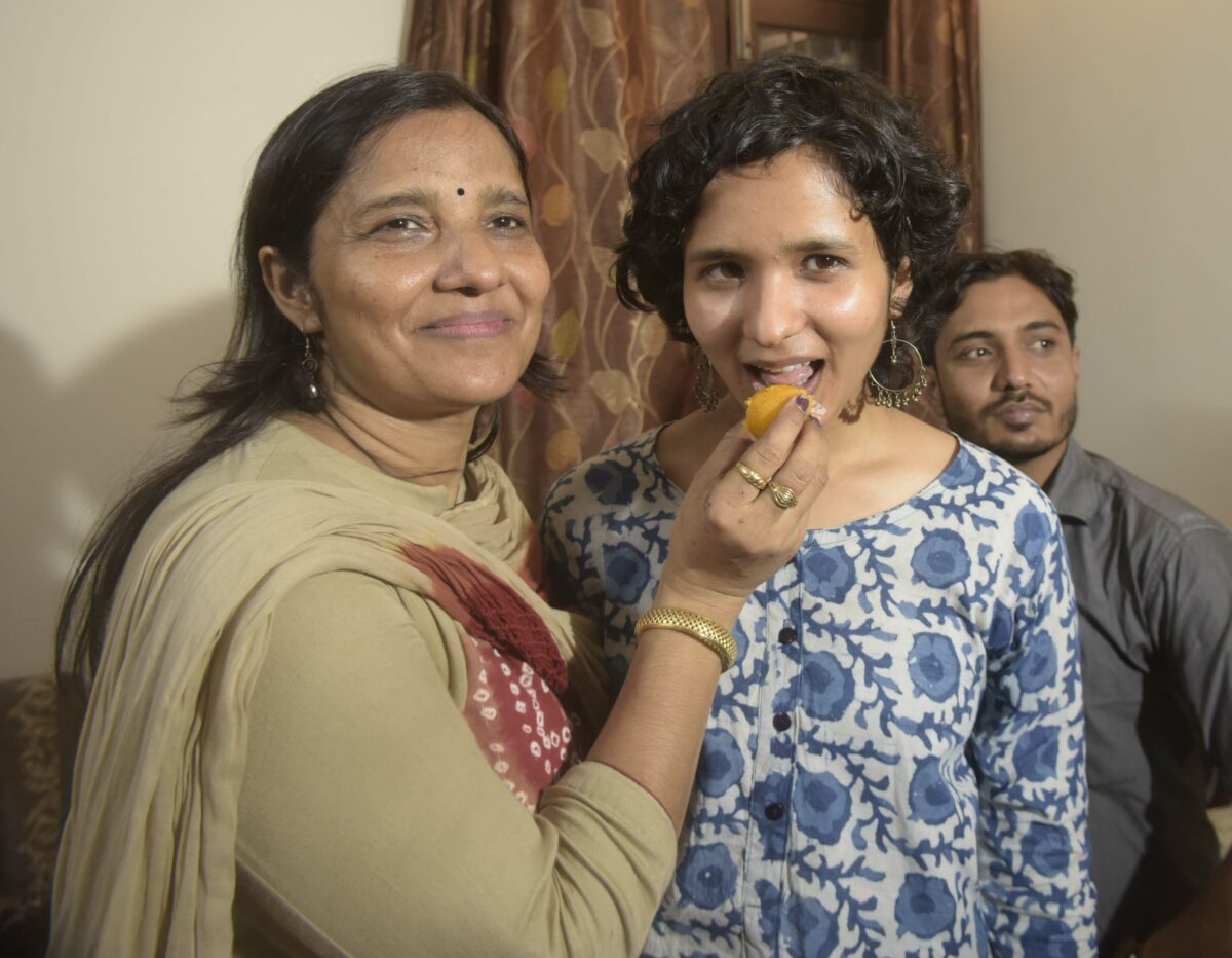 Shruti Sharma tops the Union Public Service Commission (UPSC) with her mother in New Delhi on Monday, May 30, 2022. Shruti came in first place in the civil services examination.