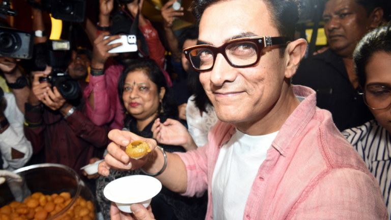 Aamir Khan eats Panipuri (Golgappa) in Mumbai during the trailer launch of his upcoming film "Lal Singh Chaddha."
