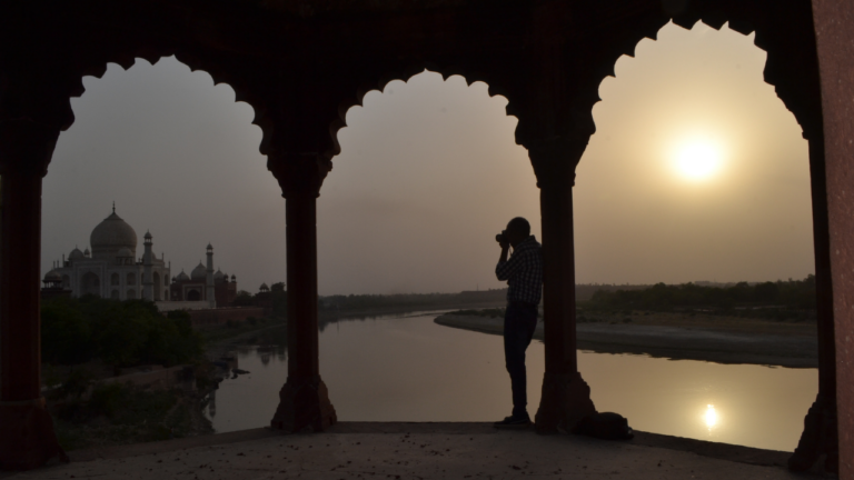 A scenic view of the Taj Mahal posts rain and view of the sunset, Agra, Uttar Pradesh.