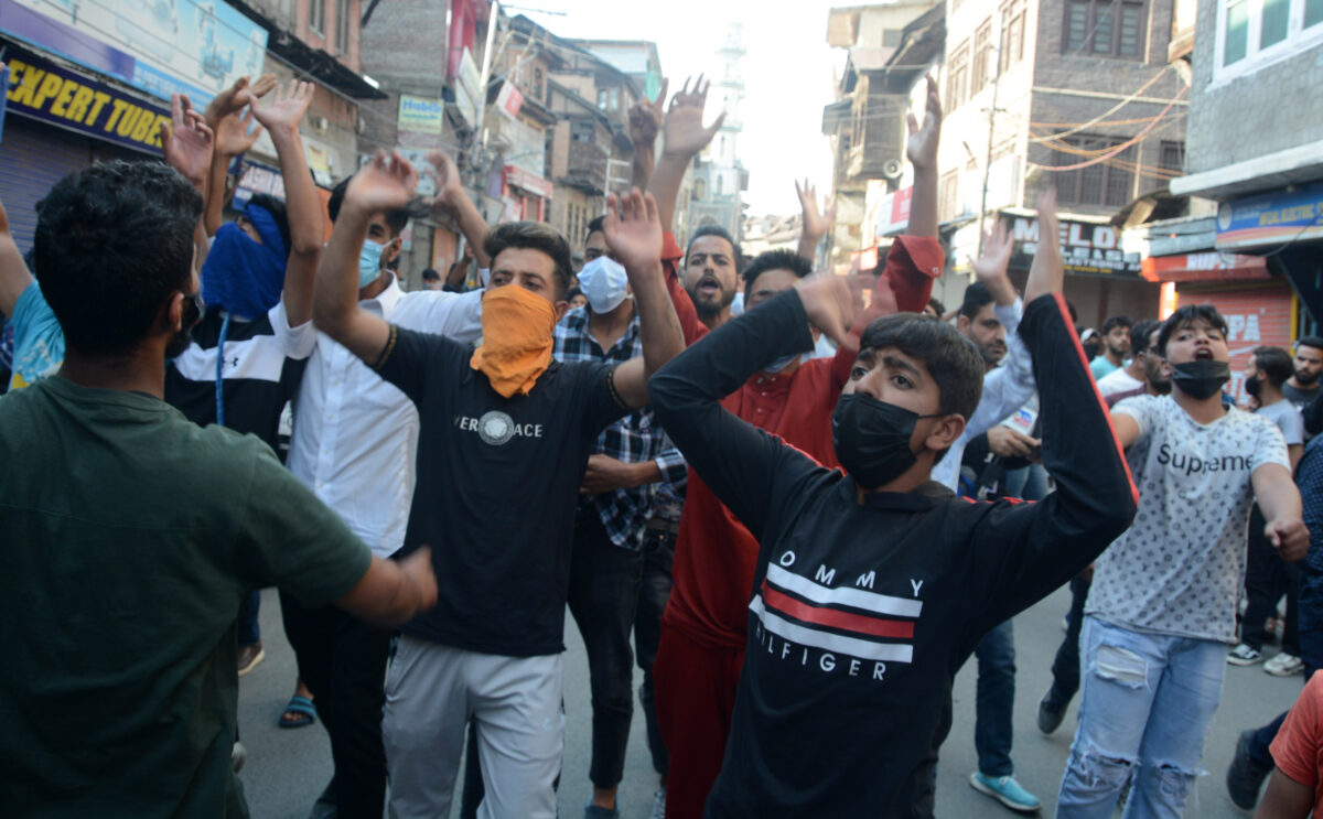 Youth shout slogans during a mass demonstrations at Maisuma Srinagar.